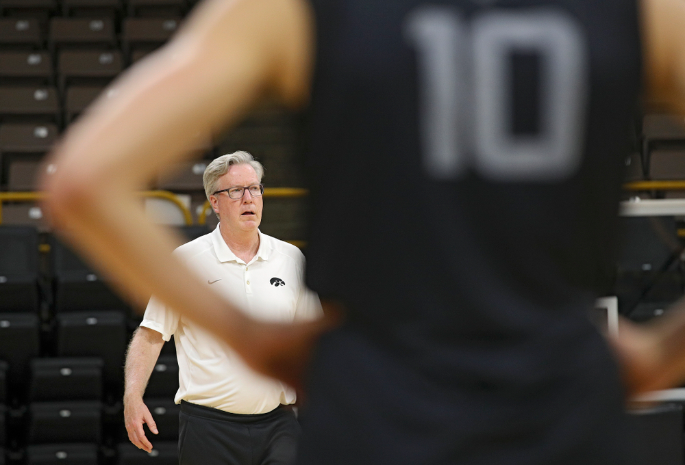 Iowa Hawkeyes head coach Fran McCaffery talks with his players as guard Joe Wieskamp (10) looks on during practice at Carver-Hawkeye Arena in Iowa City on Monday, Sep 30, 2019. (Stephen Mally/hawkeyesports.com)