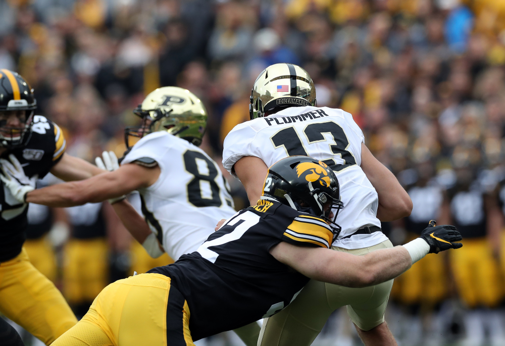 Iowa Hawkeyes defensive lineman John Waggoner (92) sacks Purdue quarterback Jack Plummer Saturday, October 19, 2019 at Kinnick Stadium. (Brian Ray/hawkeyesports.com)