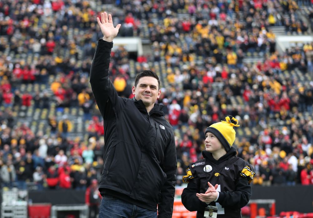 Honorary captain James Morris and Stead Family Children's Hospital Kid Captain Garret Schuster before their game against the Nebraska Cornhuskers Friday, November 23, 2018 at Kinnick Stadium. (Brian Ray/hawkeyesports.com)