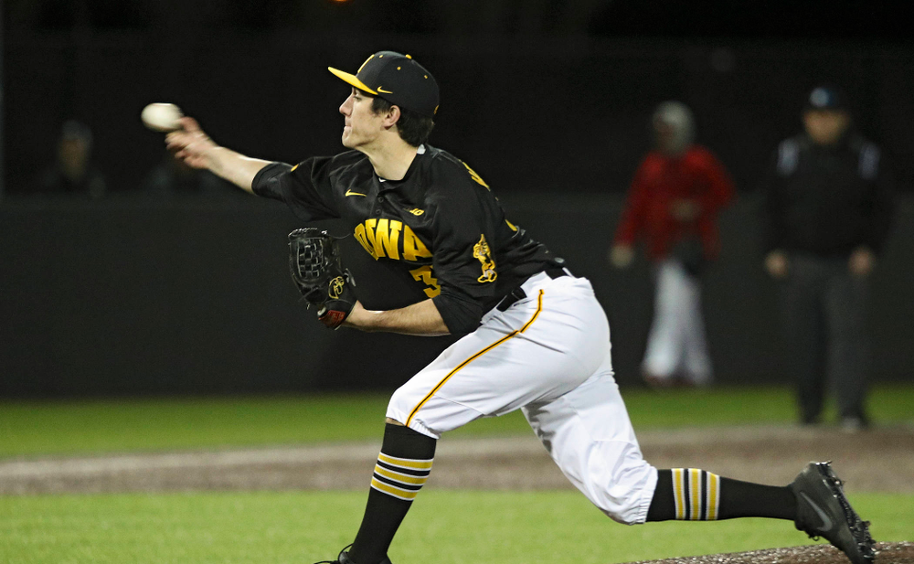 Iowa pitcher Jacob Henderson (37) delivers to the plate during the ninth inning of their game at Duane Banks Field in Iowa City on Tuesday, March 3, 2020. (Stephen Mally/hawkeyesports.com)
