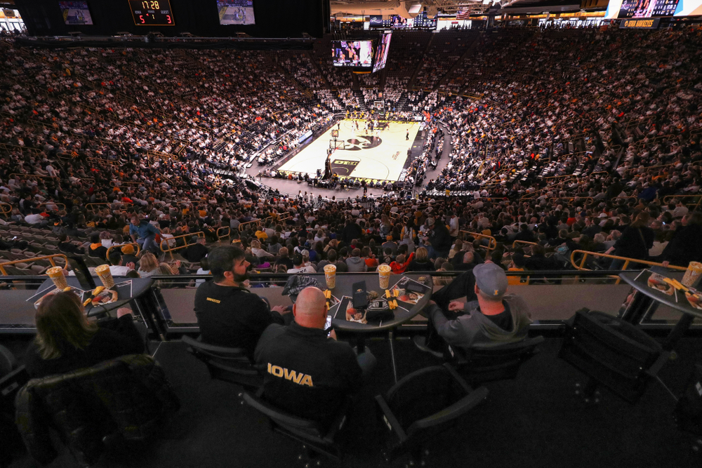 Fans sit in the terrace tables as the Iowa Hawkeyes take on the Illinois Fighting Illini Sunday, January 20