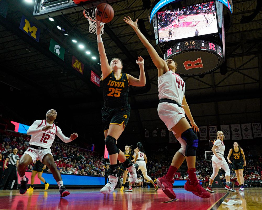 Iowa forward/center Monika Czinano (25) tries to pull in a pass during the first quarter of their game at the Rutgers Athletic Center in Piscataway, N.J. on Sunday, March 1, 2020. (Stephen Mally/hawkeyesports.com)