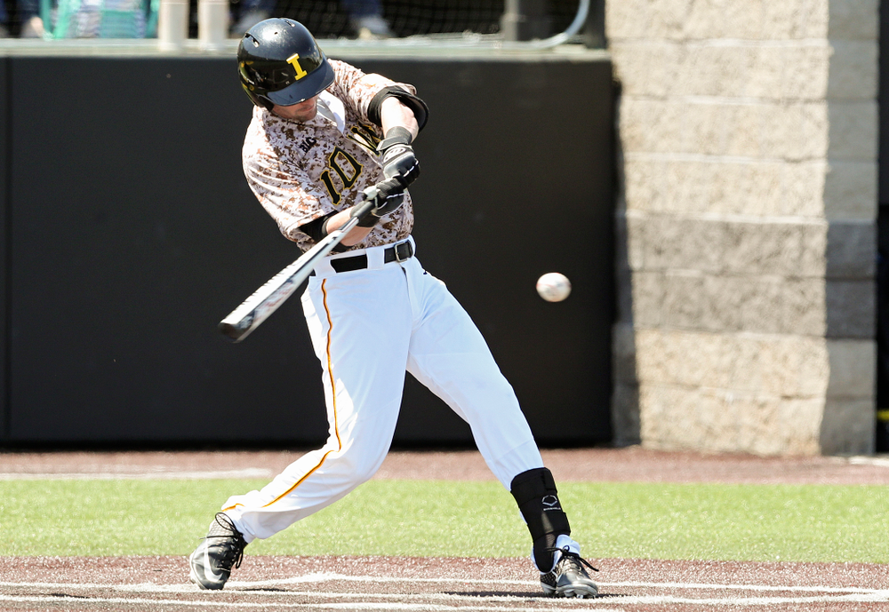 Iowa Hawkeyes left fielder Chris Whelan (28) drives a pitch for a hit during the first inning of their game against UC Irvine at Duane Banks Field in Iowa City on Sunday, May. 5, 2019. (Stephen Mally/hawkeyesports.com)