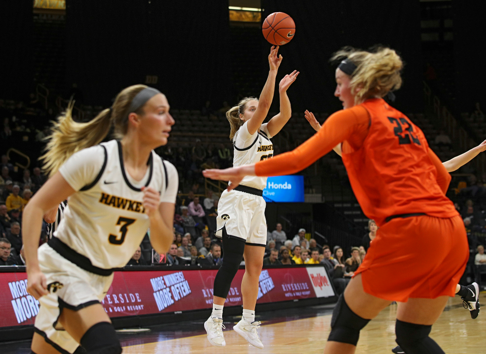 Iowa guard Kathleen Doyle (22) makes a 3-pointer during the second quarter of their overtime win against Princeton at Carver-Hawkeye Arena in Iowa City on Wednesday, Nov 20, 2019. (Stephen Mally/hawkeyesports.com)