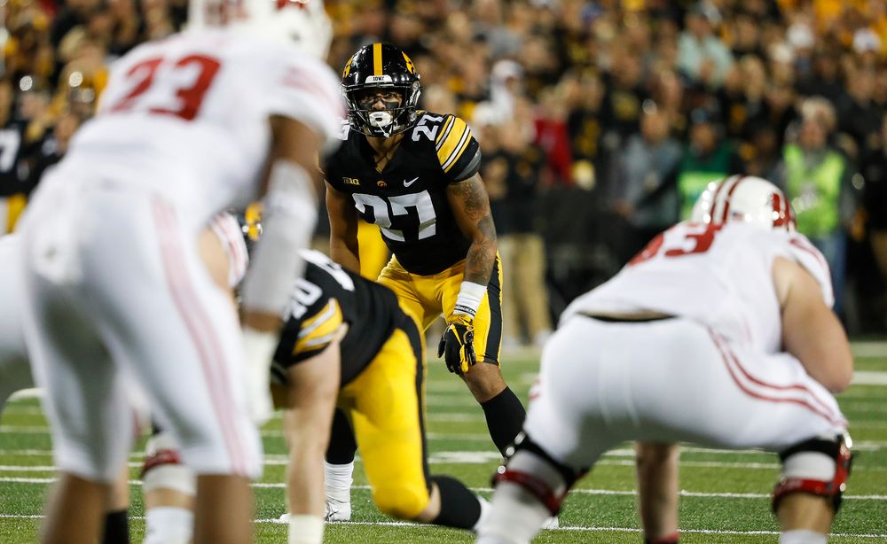 Iowa Hawkeyes defensive back Amani Hooker (27) eyes the quarterback during a game against Wisconsin at Kinnick Stadium on September 22, 2018. (Tork Mason/hawkeyesports.com)