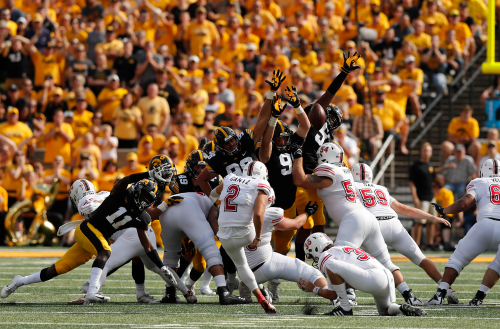 Iowa Hawkeyes defensive end Anthony Nelson (98), defensive end Matt Nelson (96), and defensive end Chauncey Golston (57) against the Northern Illinois Huskies Saturday, September 1, 2018 at Kinnick Stadium. (Brian Ray/hawkeyesports.com)