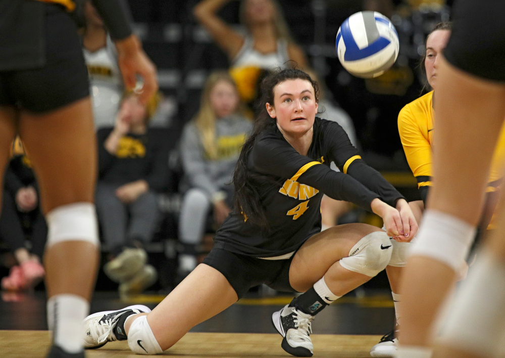 Iowa’s Halle Johnston (4) gets a dig during their match at Carver-Hawkeye Arena in Iowa City on Sunday, Oct 20, 2019. (Stephen Mally/hawkeyesports.com)