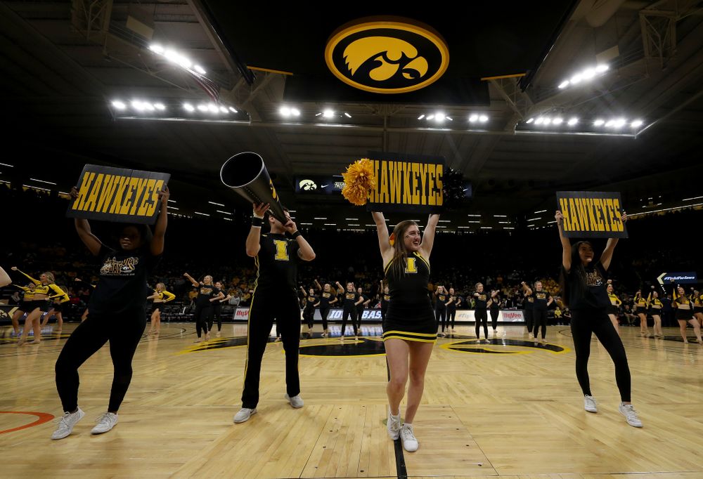 The Iowa Spirit Squad performs with participants in Spirit Squad Day at halftime of the Iowa Hawkeyes game against the Nebraska Cornhuskers Saturday, February 8, 2020 at Carver-Hawkeye Arena. (Brian Ray/hawkeyesports.com)