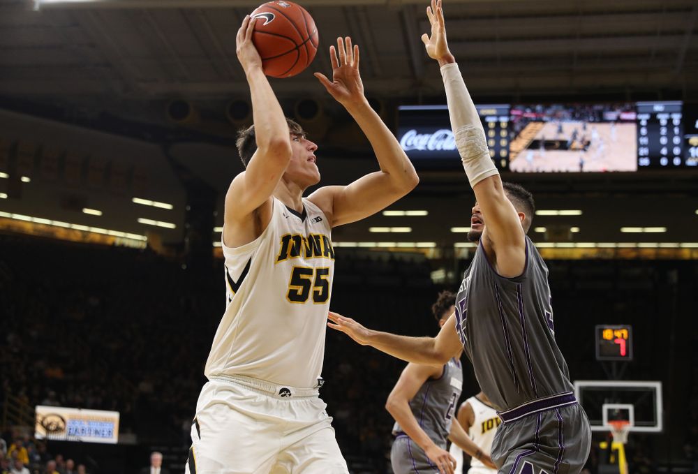 Iowa Hawkeyes forward Luka Garza (55) against the Northwestern Wildcats Sunday, February 10, 2019 at Carver-Hawkeye Arena. (Brian Ray/hawkeyesports.com)