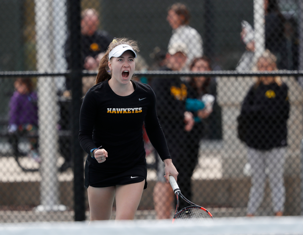 Elise Van Heuvelen and Anastasia Reimchen play a doubles match against the Wisconsin Badgers Sunday, April 22, 2018 at the Hawkeye Tennis and Recreation Center. (Brian Ray/hawkeyesports.com)