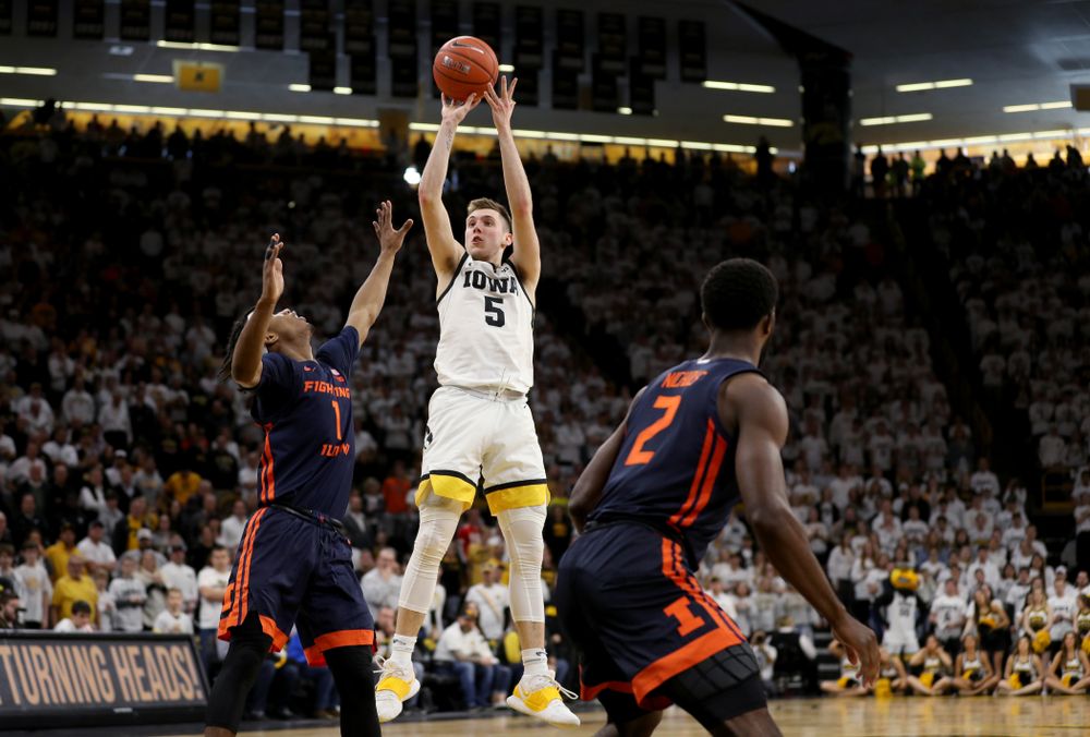 Iowa Hawkeyes guard CJ Fredrick (5) pulls up for a three point basket against the Illinois Fighting Illini Sunday, February 2, 2020 at Carver-Hawkeye Arena. (Brian Ray/hawkeyesports.com)