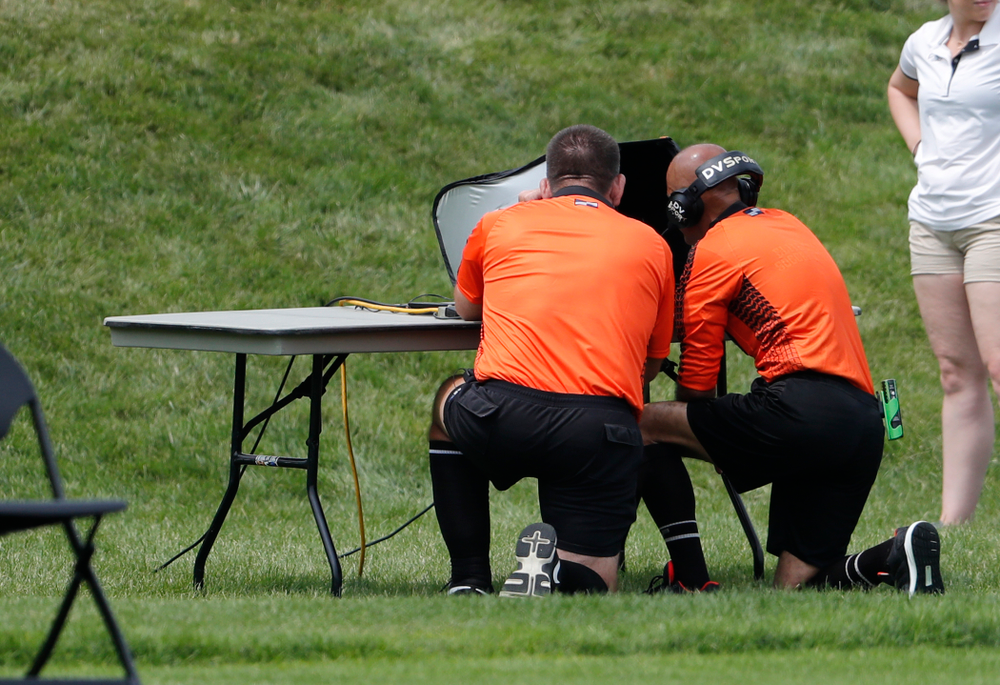 The officials check the video review of a disallowed goal against the Creighton Bluejays Sunday, August 19, 2018 at the Iowa Soccer Complex. (Brian Ray/hawkeyesports.com)
