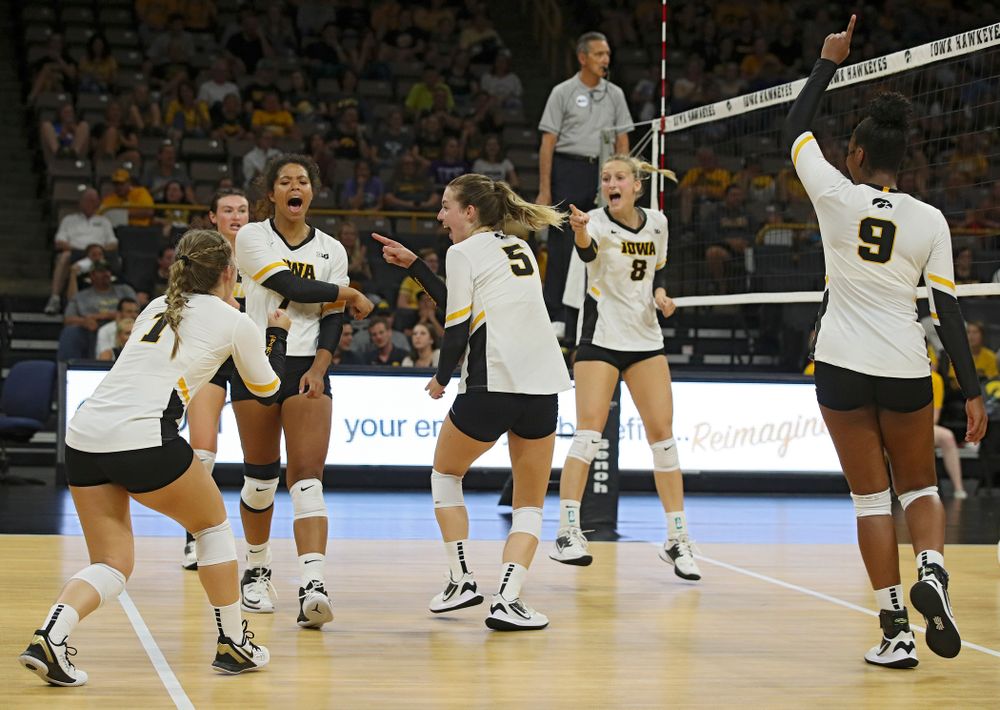 Iowa’s Joslyn Boyer (1), Halle Johnston (4), Brie Orr (7), Meghan Buzzerio (5), Kyndra Hansen (8), and Amiya Jones (9) celebrate a score during their Big Ten/Pac-12 Challenge match at Carver-Hawkeye Arena in Iowa City on Saturday, Sep 7, 2019. (Stephen Mally/hawkeyesports.com)