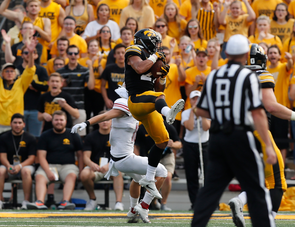 Iowa Hawkeyes defensive back Amani Hooker (27) interceptss a pass against the Northern Illinois Huskies Saturday, September 1, 2018 at Kinnick Stadium. (Brian Ray/hawkeyesports.com)