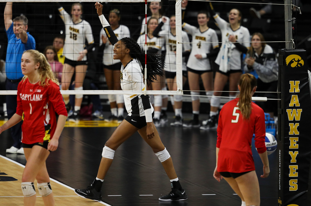 Iowa Hawkeyes outside hitter Taylor Louis (16) celebrates after winning a point during a match against Maryland at Carver-Hawkeye Arena on November 23, 2018. (Tork Mason/hawkeyesports.com)