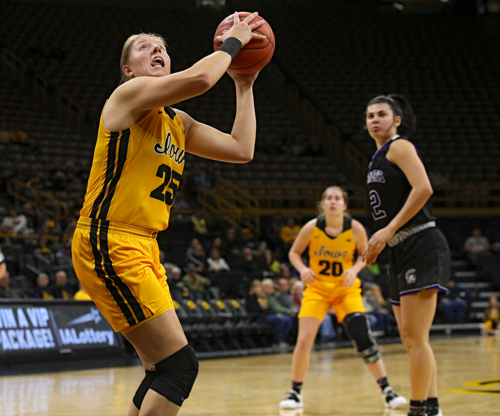 Iowa forward/center Monika Czinano (25) eyes the basket before making a bucket during the third quarter of their game against Winona State at Carver-Hawkeye Arena in Iowa City on Sunday, Nov 3, 2019. (Stephen Mally/hawkeyesports.com)