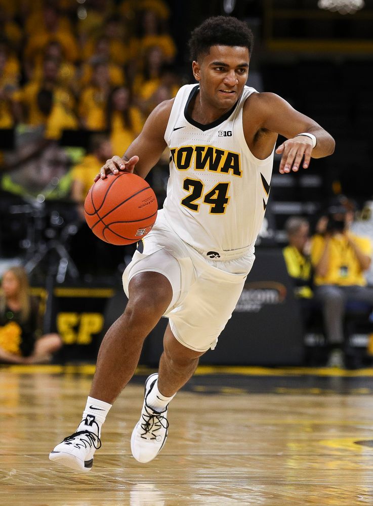 Iowa Hawkeyes guard Nicolas Hobbs (24) brings the ball upcourt during a game against Guilford College at Carver-Hawkeye Arena on November 4, 2018. (Tork Mason/hawkeyesports.com)