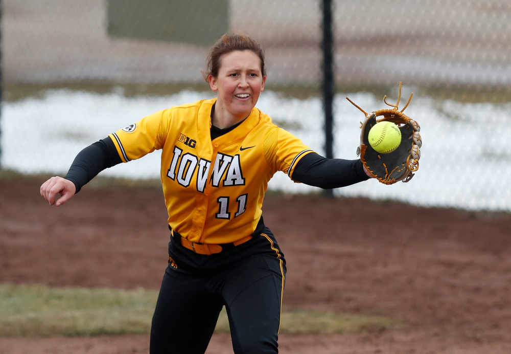 Iowa Hawkeyes starting pitcher/relief pitcher Mallory Kilian (11) against UW Green Bay Tuesday, March 27, 2018 at Bob Pearl Field. (Brian Ray/hawkeyesports.com)