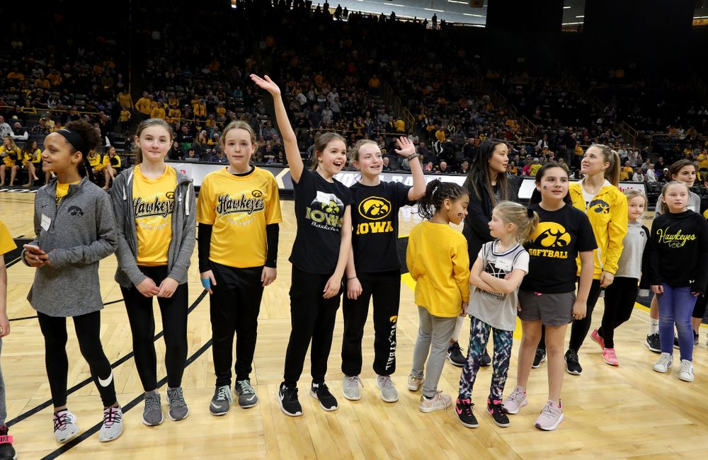 Female Athletes and participants in a youth clinic are recognized as part of National Girls and Women in Sports Day during the Iowa Hawkeyes game against Penn State Saturday, February 22, 2020 at Carver-Hawkeye Arena. (Brian Ray/hawkeyesports.com)