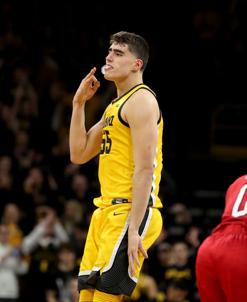 Iowa Hawkeyes forward Luka Garza (55) celebrates a three point basket against the Nebraska Cornhuskers Saturday, February 8, 2020 at Carver-Hawkeye Arena. (Brian Ray/hawkeyesports.com)