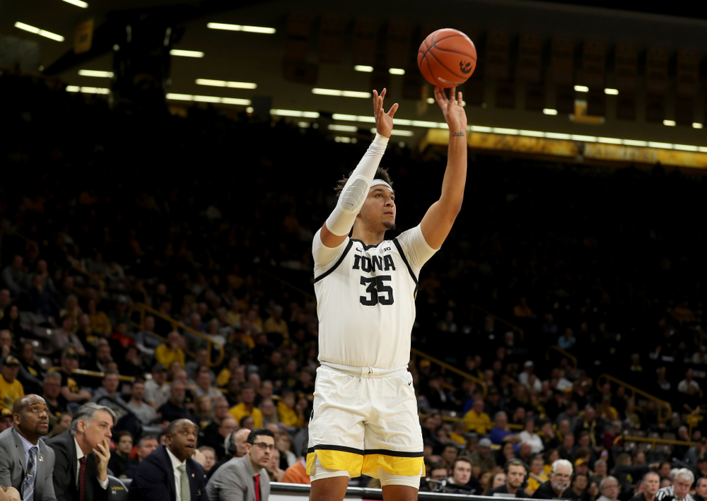 Iowa Hawkeyes forward Cordell Pemsl (35) makes his first career three point basket against the Maryland Terrapins Friday, January 10, 2020 at Carver-Hawkeye Arena. (Brian Ray/hawkeyesports.com)