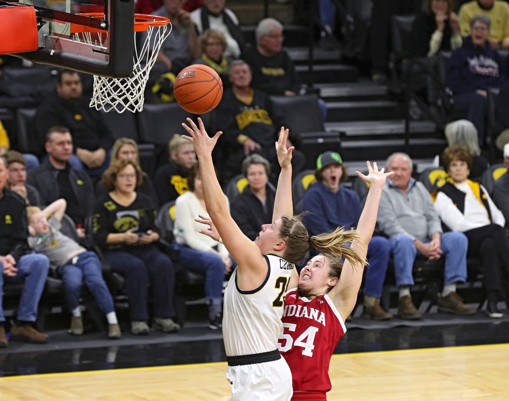Iowa Hawkeyes forward Monika Czinano (25) scores a basket during the fourth quarter of their game at Carver-Hawkeye Arena in Iowa City on Sunday, January 12, 2020. (Stephen Mally/hawkeyesports.com)