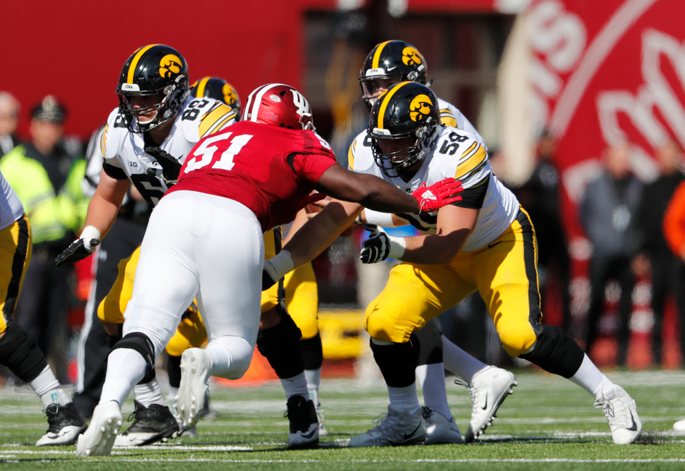 Iowa Hawkeyes offensive lineman Jake Newborg (58) and offensive lineman Keegan Render (69) against the Indiana Hoosiers Saturday, October 13, 2018 at Memorial Stadium, in Bloomington, Ind. (Brian Ray/hawkeyesports.com)