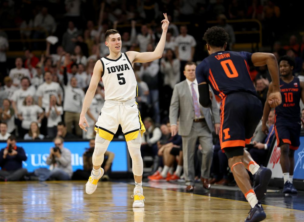 Iowa Hawkeyes guard CJ Fredrick (5) pulls up for a three point basket against the Illinois Fighting Illini Sunday, February 2, 2020 at Carver-Hawkeye Arena. (Brian Ray/hawkeyesports.com)