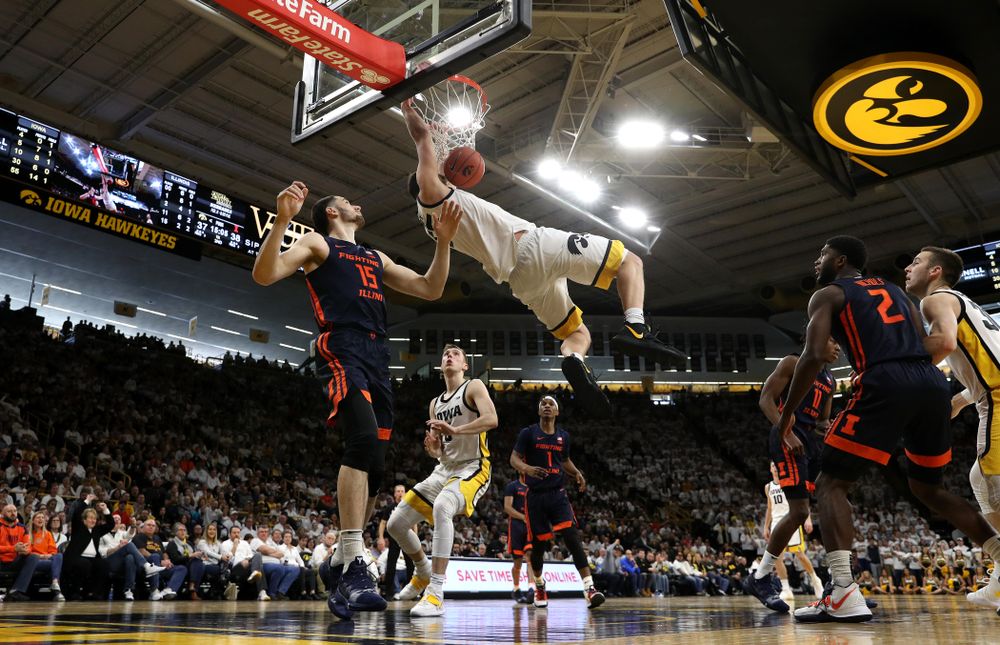 Iowa Hawkeyes forward Luka Garza (55) dunks the ball against the Illinois Fighting Illini Sunday, February 2, 2020 at Carver-Hawkeye Arena. (Brian Ray/hawkeyesports.com)