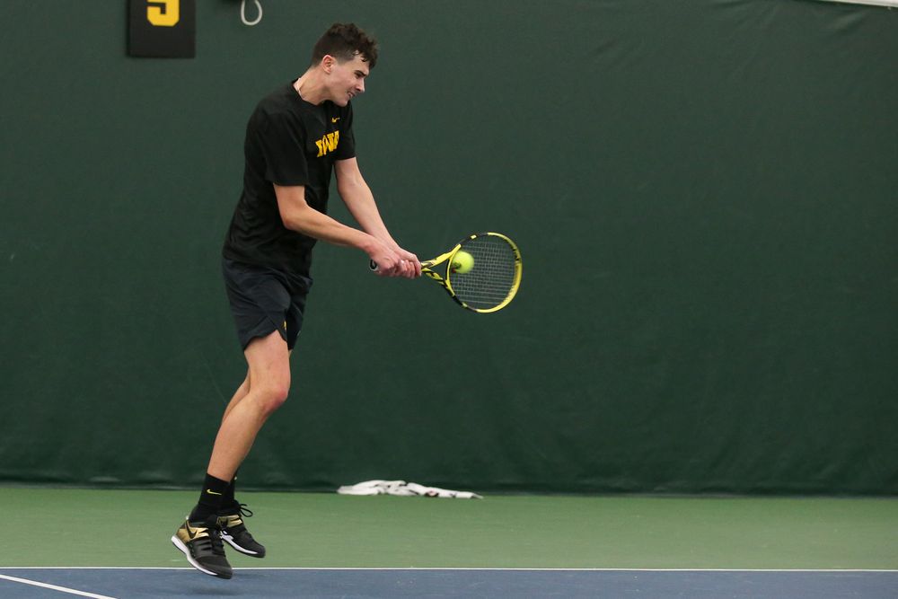 Iowa’s Matt Clegg returns a ball during the Iowa men’s tennis meet vs VCU on Saturday, February 29, 2020 at the Hawkeye Tennis and Recreation Complex. (Lily Smith/hawkeyesports.com)