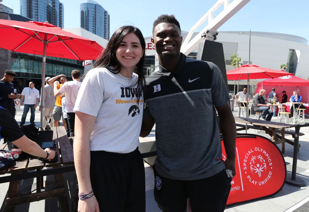 Iowa Hawkeyes forward Megan Gustafson (10) with DukeÕs Zion Williamson during a Special Olympics event Friday, April 12, 2019 as part of the ESPN College Basketball Awards in the XBOX Plaza at LA Live. (Brian Ray/hawkeyesports.com)