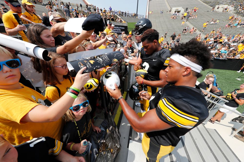Iowa Hawkeyes running back Ivory Kelly-Martin (21) and wide receiver Tyrone Tracy Jr. (3) during Kids Day Saturday, August 11, 2018 at Kinnick Stadium. (Brian Ray/hawkeyesports.com)