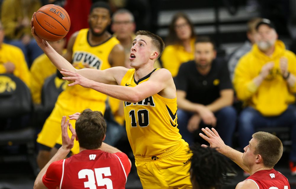 Iowa Hawkeyes guard Joe Wieskamp (10) goes up for a layup against Wisconsin on November 30, 2018 at Carver-Hawkeye Arena. (Tork Mason/hawkeyesports.com)