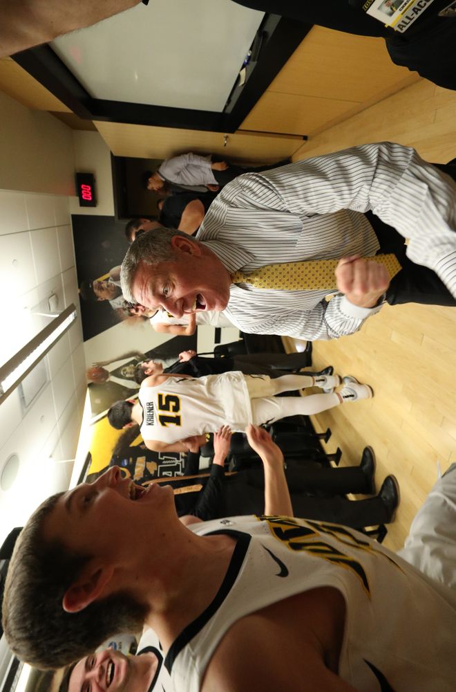 Iowa Hawkeyes guard Austin Ash (13) and assistant coach Kirk Speraw against the Michigan Wolverines Friday, February 1, 2019 at Carver-Hawkeye Arena. (Brian Ray/hawkeyesports.com)