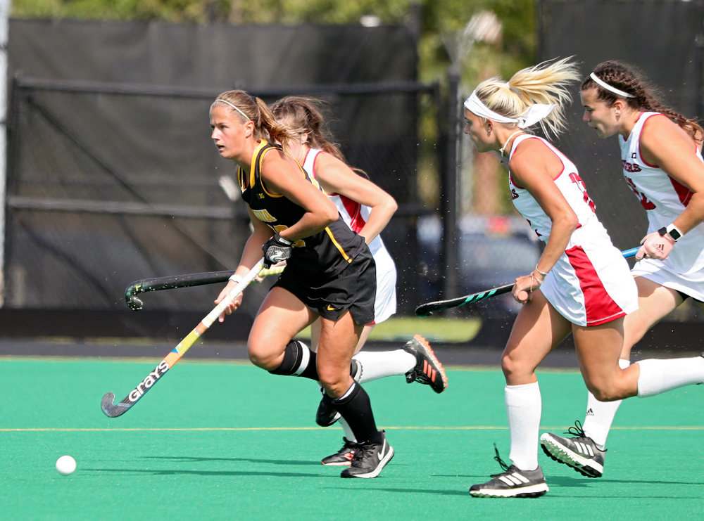 Iowa’s Sophie Sunderland (20) moves with the ball during the first quarter of their match at Grant Field in Iowa City on Friday, Oct 4, 2019. (Stephen Mally/hawkeyesports.com)