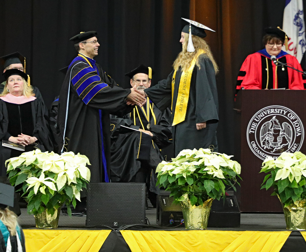 Iowa Track and Field’s Allison Wahrman during the College of Liberal Arts and Sciences and University College Fall 2019 Commencement ceremony at Carver-Hawkeye Arena in Iowa City on Saturday, December 21, 2019. (Stephen Mally/hawkeyesports.com)