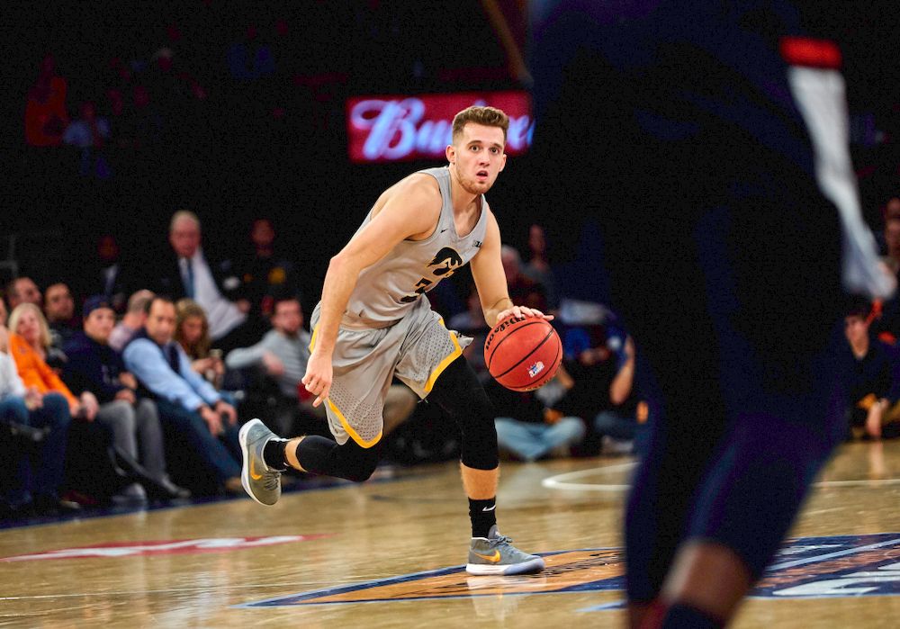 Iowa Hawkeyes guard Jordan Bohannon (3) against UConn in the Championship game of the 2K Empire Classic Friday, November 16, 2018 at Madison Square Garden in New York City. (Duncan H.Williams/Freelance)