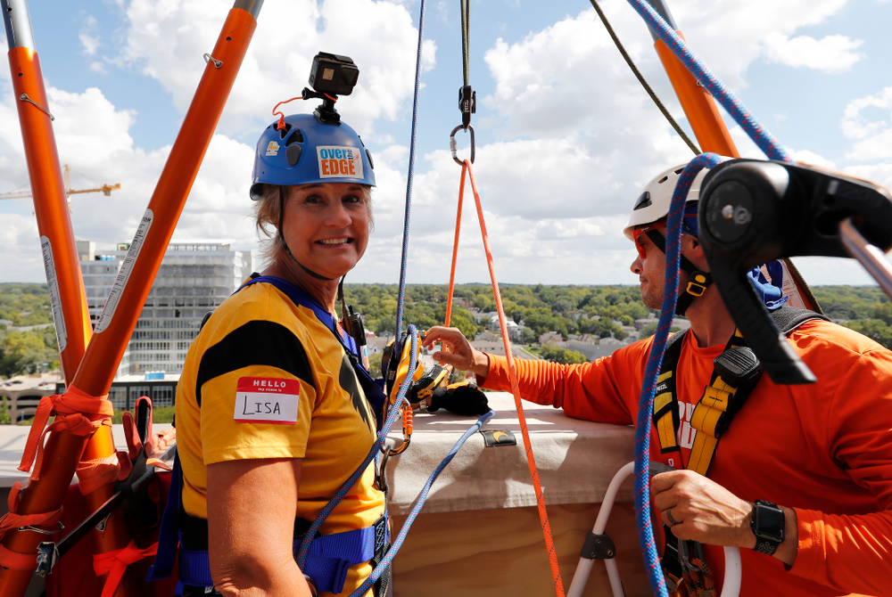 Iowa Women's Basketball head coach Lisa Bluder goes Over The Edge to benefit Ronald McDonald House Charities of Eastern Iowa and Western Illinois Friday, September 14, 2018 in downtown Iowa City.(Brian Ray/hawkeyesports.com)