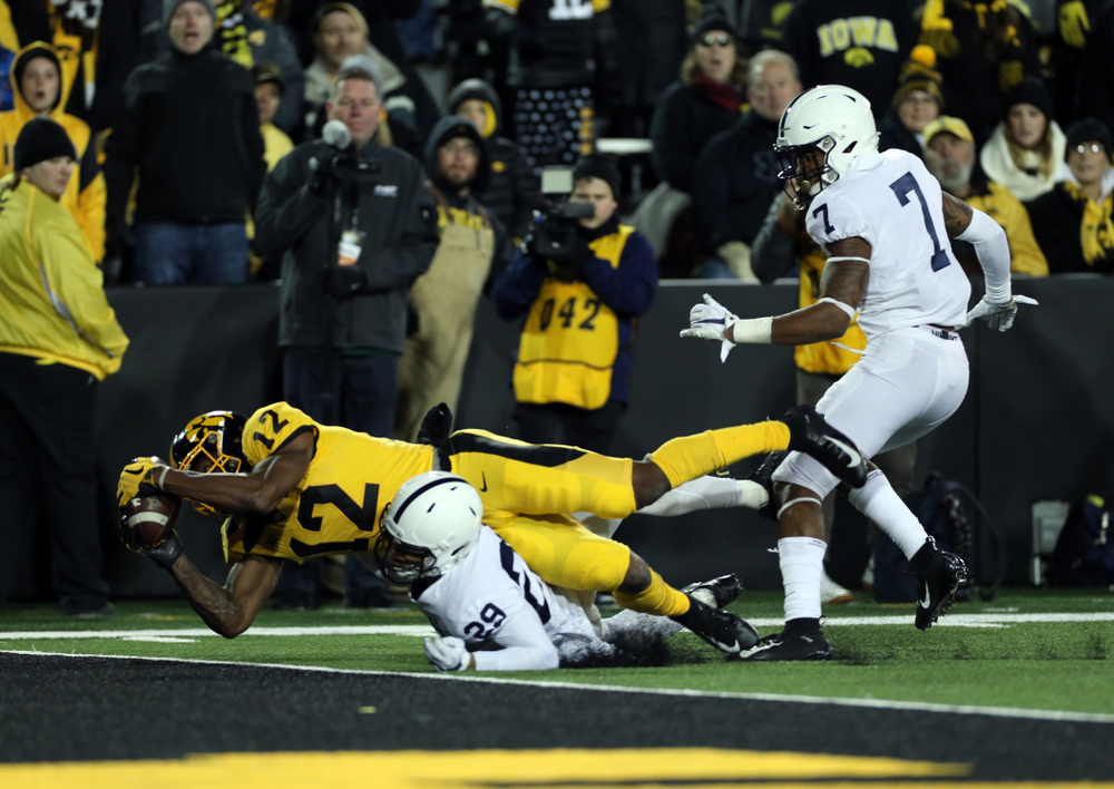 Iowa Hawkeyes wide receiver Brandon Smith (12) catches a touchdown pass against the Penn State Nittany Lions Saturday, October 12, 2019 at Kinnick Stadium. (Brian Ray/hawkeyesports.com)