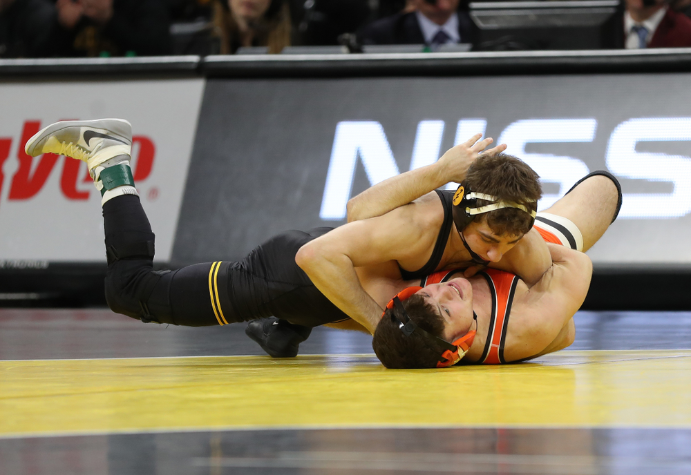 Iowa’s Austin DeSanto Wrestles Oklahoma State’s Reece Witcraft at 133 pounds Sunday, February 23, 2020 at Carver-Hawkeye Arena. DeSanto won the match by fall. (Brian Ray/hawkeyesports.com)