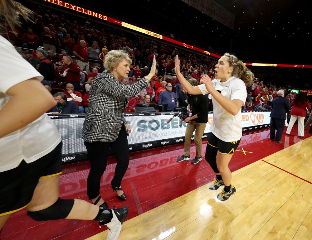 Iowa Hawkeyes head coach Lisa Bluder and guard Kathleen Doyle (22) against the Iowa State Cyclones Wednesday, December 11, 2019 at Hilton Coliseum in Ames, Iowa(Brian Ray/hawkeyesports.com)
