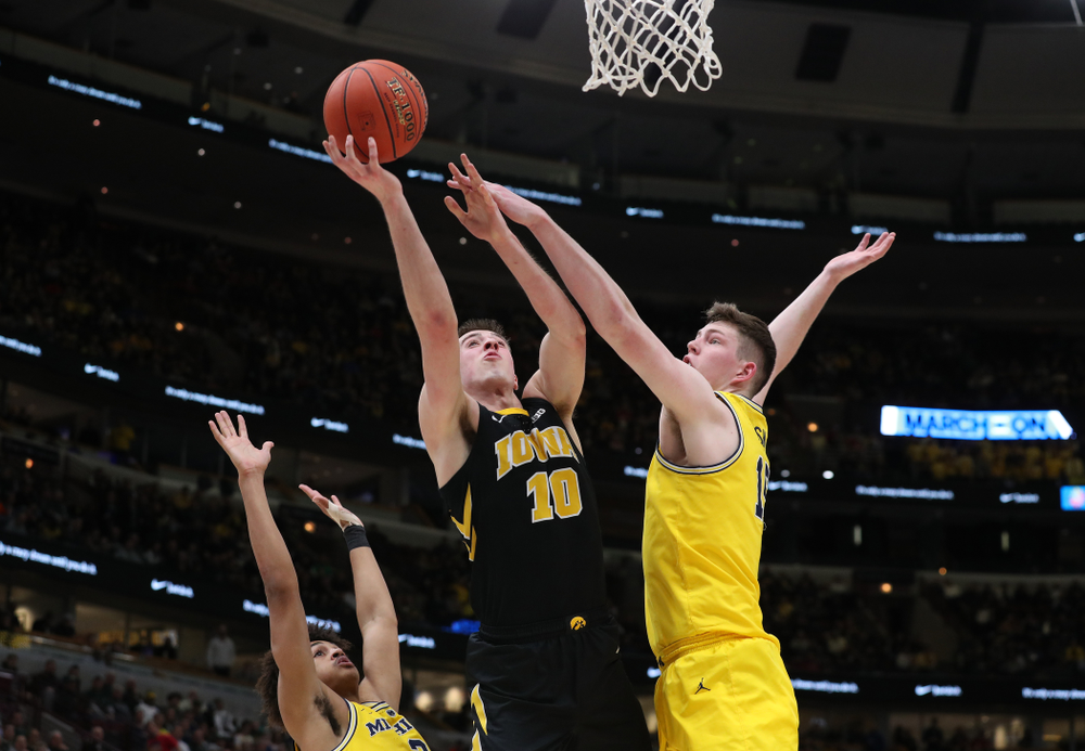 Iowa Hawkeyes guard Joe Wieskamp (10) against the Michigan Wolverines in the 2019 Big Ten Men's Basketball Tournament Friday, March 15, 2019 at the United Center in Chicago. (Brian Ray/hawkeyesports.com)