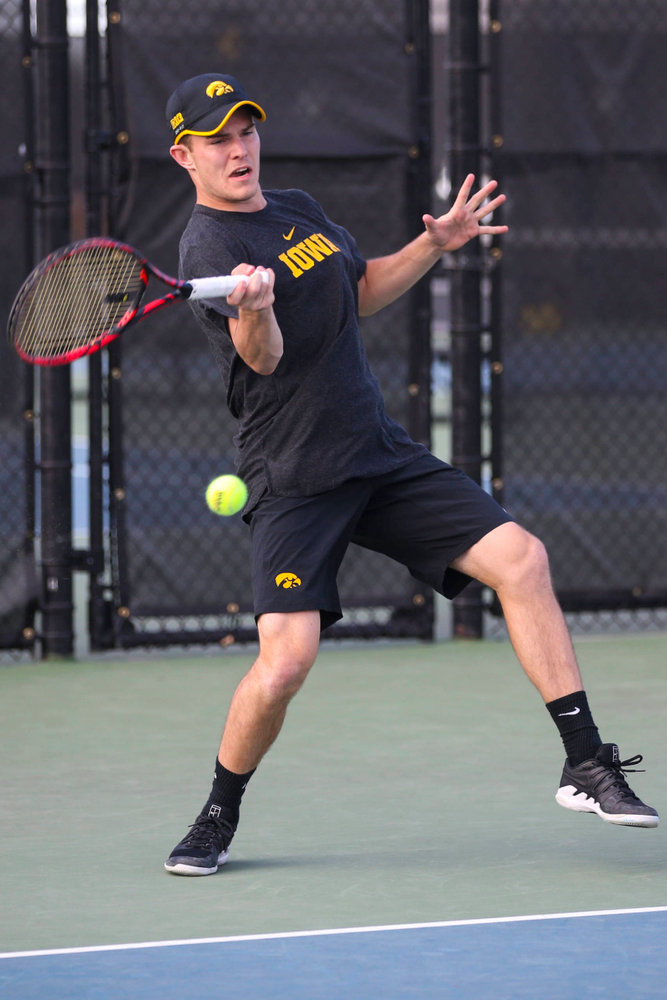 IowaÕs Jonas Larsen at tennis vs Illinois State on Sunday, April 21, 2019 at the Hawkeye Tennis and Recreation Complex. (Lily Smith/hawkeyesports.com)