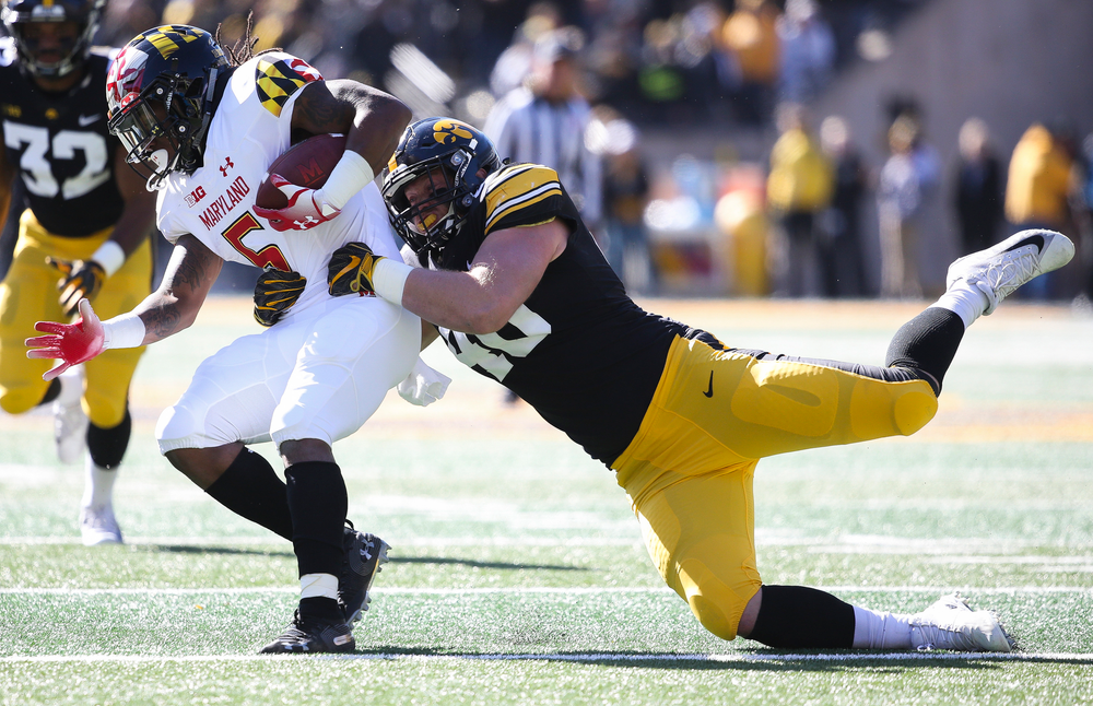 Iowa Hawkeyes defensive end Parker Hesse (40) makes a tackle for loss during a game against Maryland at Kinnick Stadium on October 20, 2018. (Tork Mason/hawkeyesports.com)