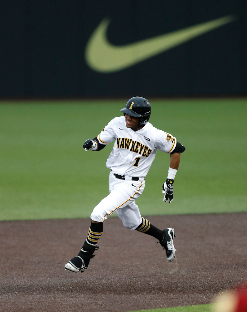Iowa Hawkeyes third baseman Lorenzo Elion (1) triples against Coe College Wednesday, April 11, 2018 at Duane Banks Field. (Brian Ray/hawkeyesports.com)