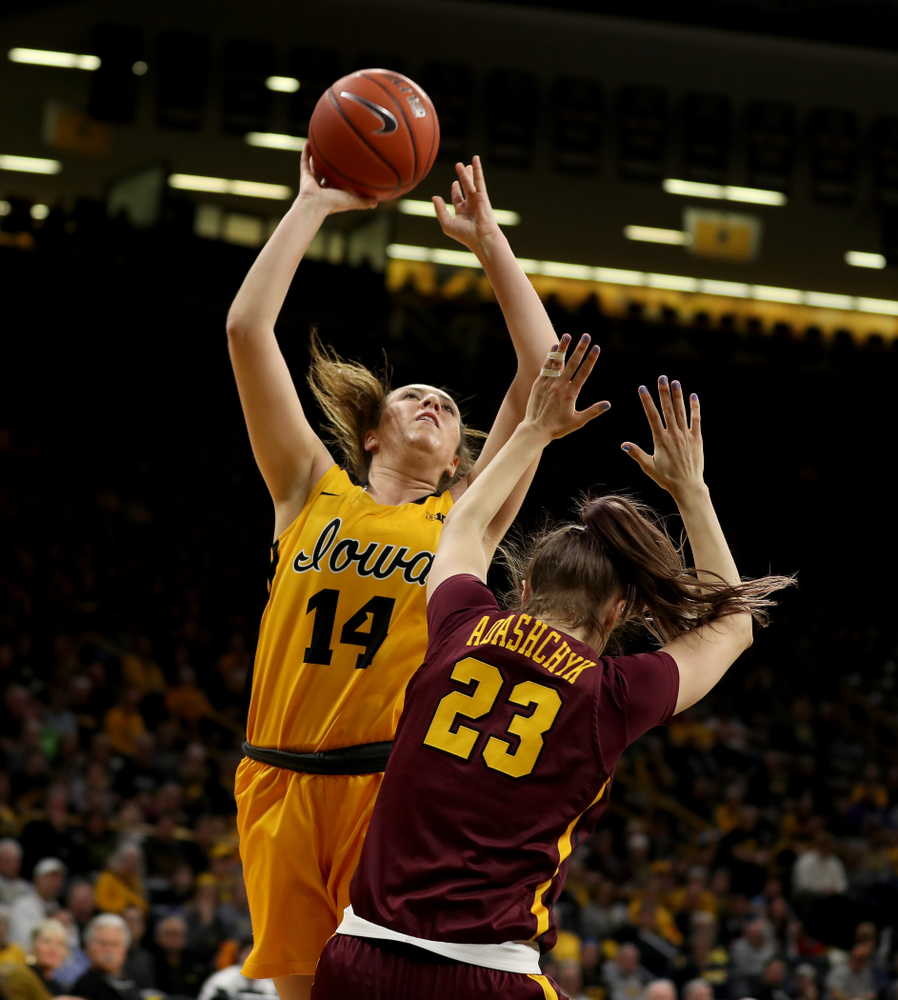 Iowa Hawkeyes forward McKenna Warnock (14) against the Minnesota Golden Gophers Thursday, February 27, 2020 at Carver-Hawkeye Arena. (Brian Ray/hawkeyesports.com)