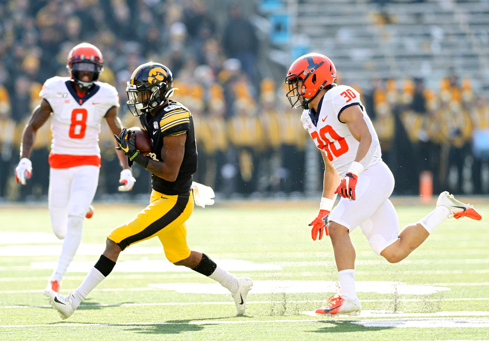 Iowa Hawkeyes wide receiver Ihmir Smith-Marsette (6) pulls in a pass during the second quarter of their game at Kinnick Stadium in Iowa City on Saturday, Nov 23, 2019. (Stephen Mally/hawkeyesports.com)
