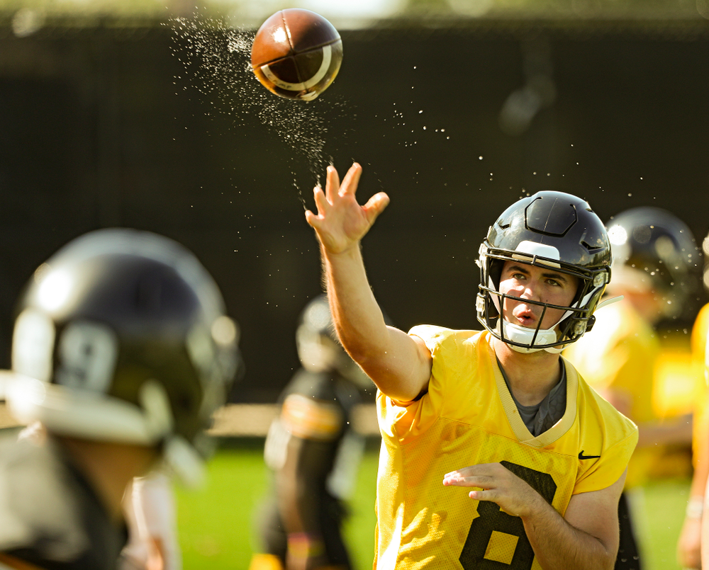 Iowa Hawkeyes quarterback Alex Padilla (8) throws a wet football as they run a drill during Fall Camp Practice No. 13 at the Hansen Football Performance Center in Iowa City on Friday, Aug 16, 2019. (Stephen Mally/hawkeyesports.com)