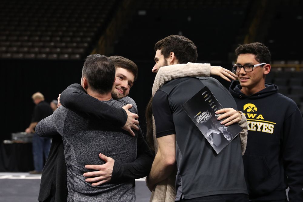Iowa Men's Gymnast Rogelio Vazquez and his family during senior day ceremonies following their meet against the Ohio State Buckeyes Saturday, March 16, 2019 at Carver-Hawkeye Arena. (Brian Ray/hawkeyesports.com)
