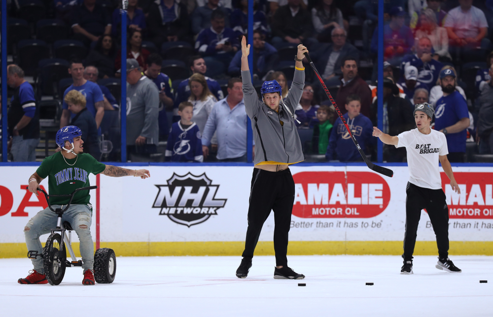 Iowa Hawkeyes tight end T.J. Hockenson (38) celebrates after making a goal during a contest against Mississippi State in the first intermission of the Tampa Bay Lightning game Thursday, December 27, 2018 at Amalie Arena. (Brian Ray/hawkeyesports.com)